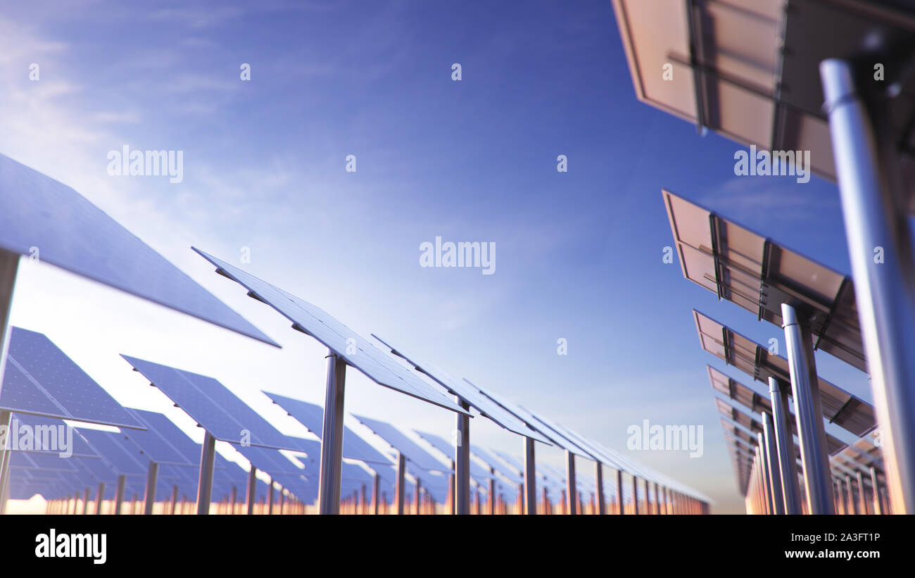 Solar panels at sunset. Alternative energy. Ecological, clean energy. Photovoltaic solar panels, with reflection of a beautiful evening sky. Solar Stock Photo