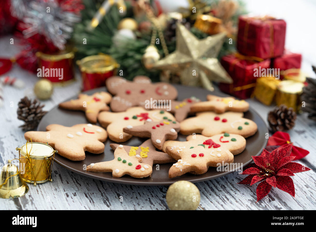Presenting traditional gingerbread cookies with ornaments for christmas celebration. Stock Photo