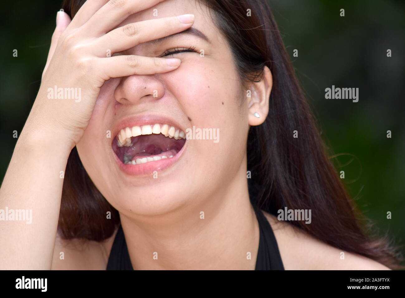 A Youthful Woman Laughing Stock Photo