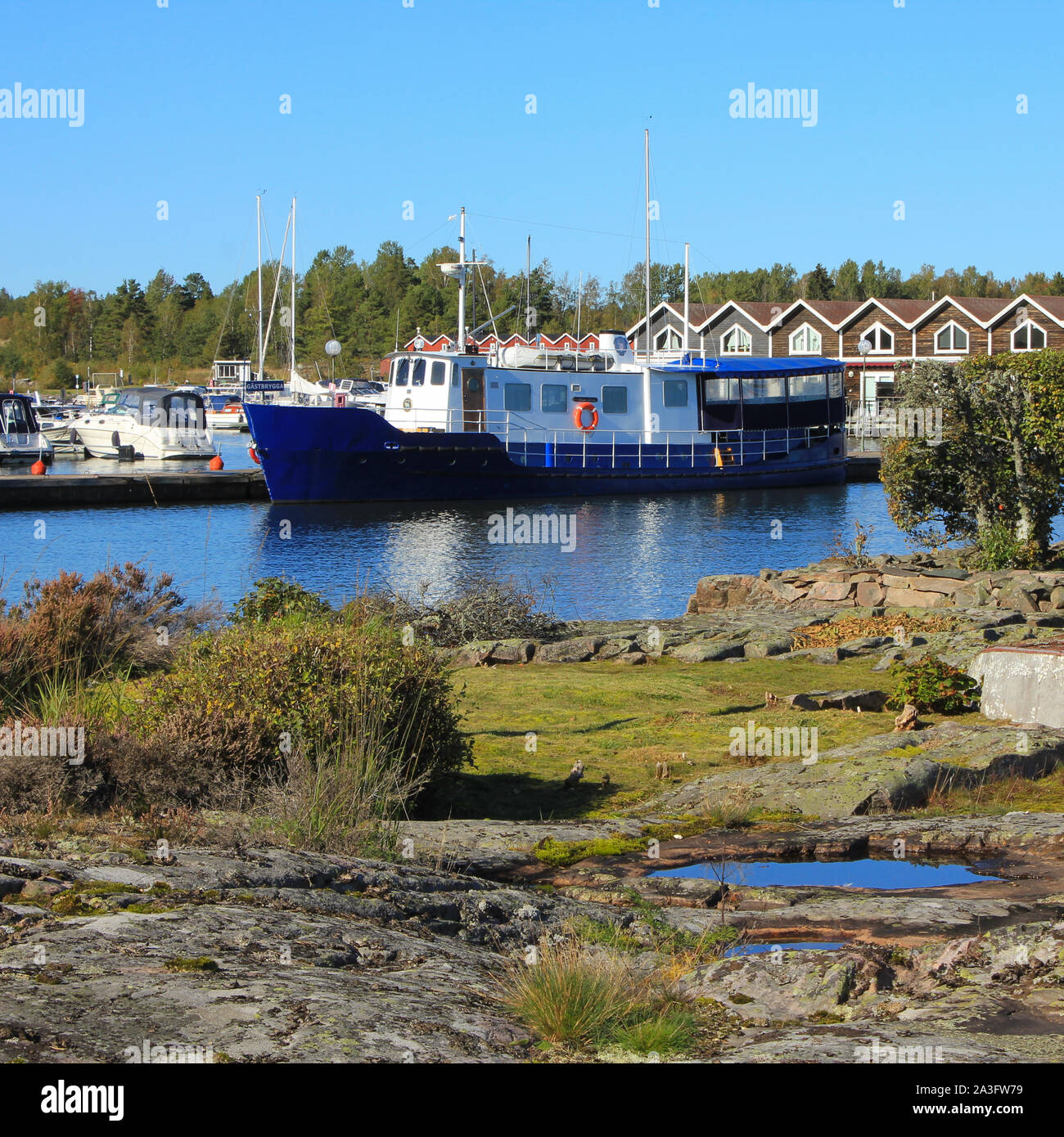 Ship in Sunnanå Hamn, small harbour in Mellerud. Dalsland, Sweden. Stock Photo