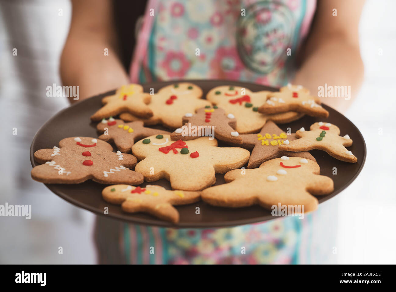Serving traditional gingerbread cookies for new year celebration. Stock Photo