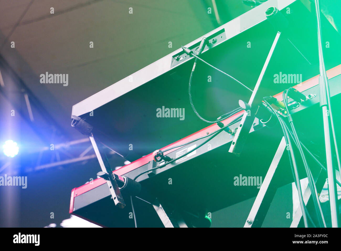 Modern synthesizers on the stage. Concert preparation. Stock Photo