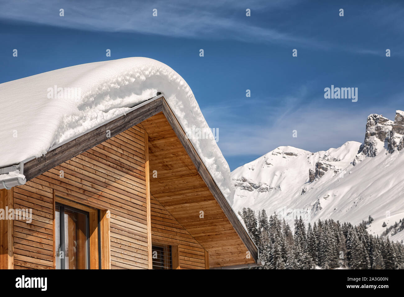 wooden house in the swiss alps Stock Photo Alamy