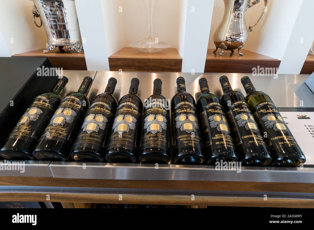 A row of prestige wines from 1973 to 1995 on sale at the Wolf Blass winery visitors centre in the Barossa Valley wine region in South Australia.   The Stock Photo