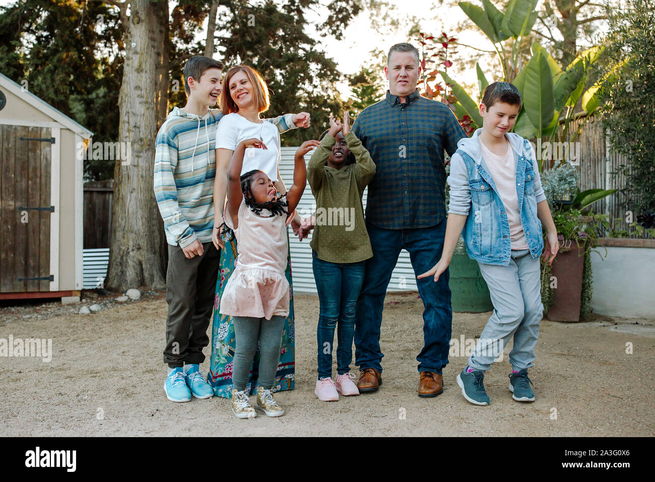 Happy mixedrace family acting silly Stock Photo Alamy