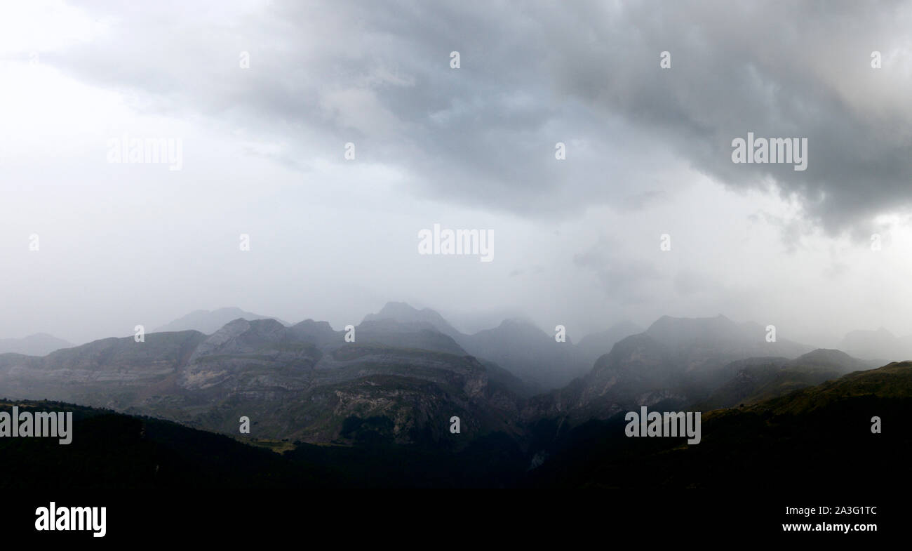 Hilly landscape during a storm in the Pyrenees. Stock Photo