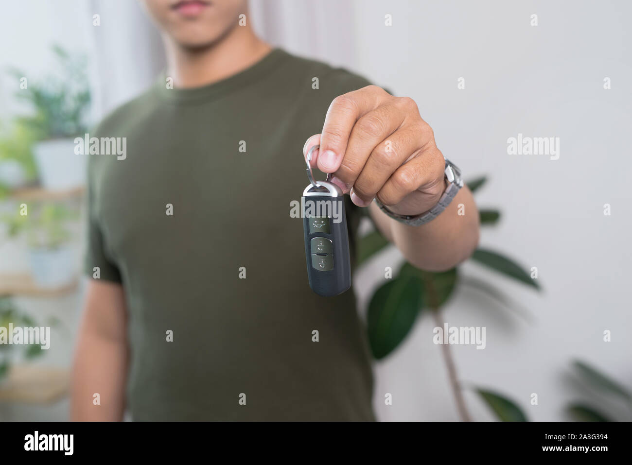 Young chinese man driving car hi-res stock photography and images - Alamy