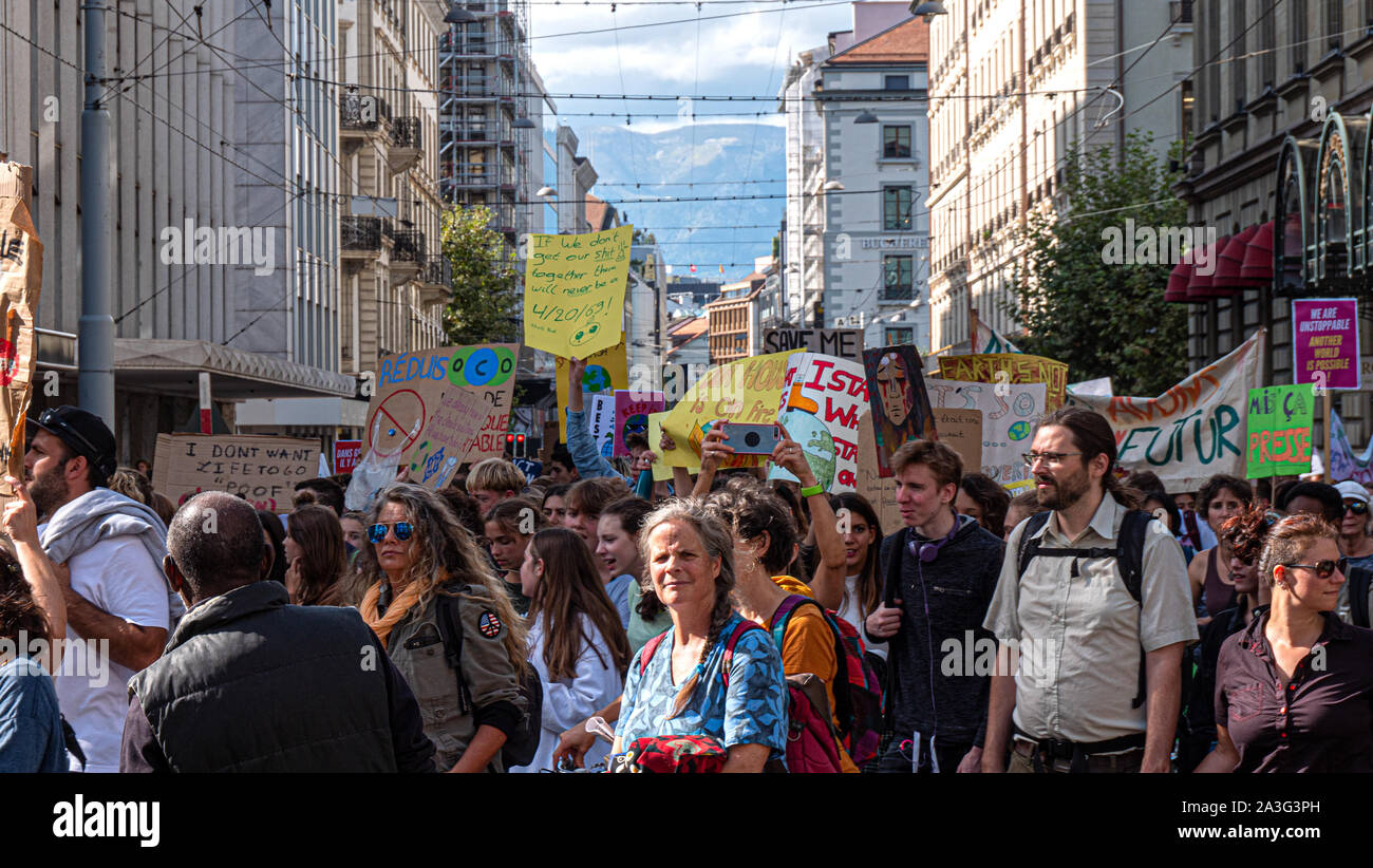 Protest demonstrators take part in the global march for Climate change to raise awareness of environmental issues Stock Photo