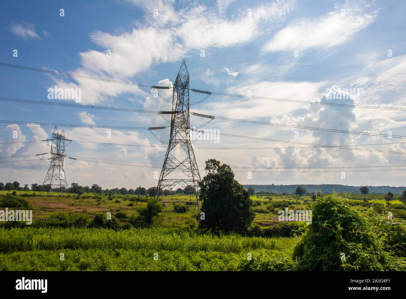 high voltage post.High-voltage tower blue sky white clouds Stock Photo