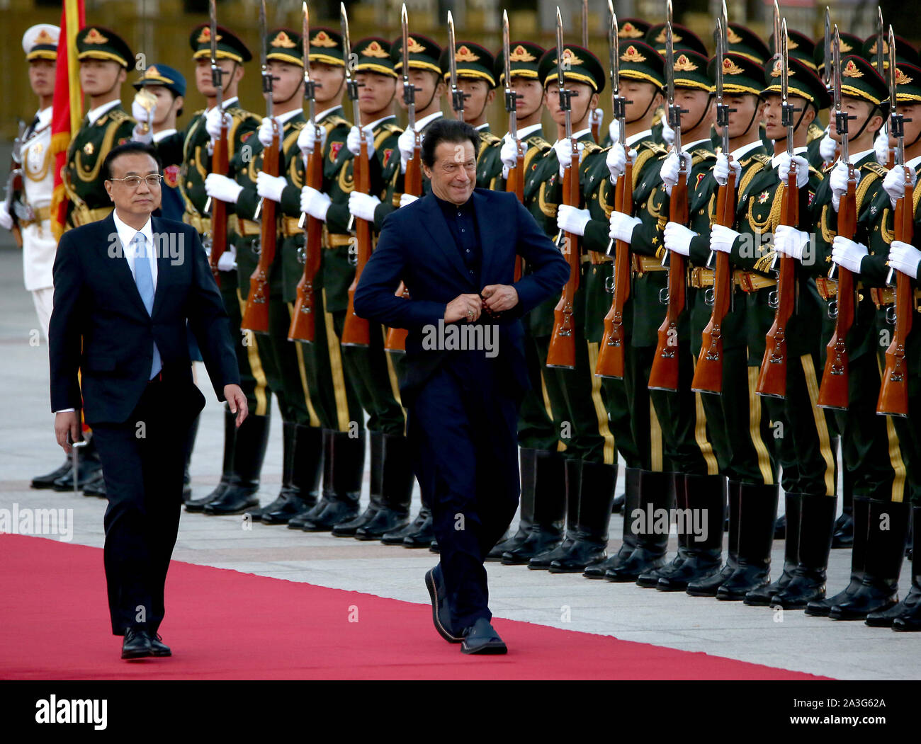 Beijing, China. 08th Oct, 2019. Pakistani Prime Minister Imran Khan (R) is escorted by Chinese Premier Li Keqiang during a welcoming ceremony at the Great Hall of the People in Beijing on Tuesday, October 8, 2019. Khan begins a two-day visit to China to help rally support for more financial investment after infrastructure project spending declined sharply. Photo by Stephen Shaver/UPI Credit: UPI/Alamy Live News Stock Photo