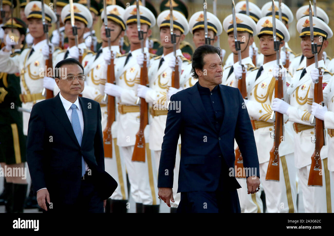 Beijing, China. 08th Oct, 2019. Pakistani Prime Minister Imran Khan (R) is escorted by Chinese Premier Li Keqiang during a welcoming ceremony at the Great Hall of the People in Beijing on Tuesday, October 8, 2019. Khan begins a two-day visit to China to help rally support for more financial investment after infrastructure project spending declined sharply. Photo by Stephen Shaver/UPI Credit: UPI/Alamy Live News Stock Photo