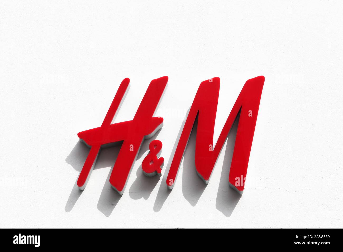Copenhagen, Denmark - August 4, 2019: H & M logo on a facade. H & M is a swedish multinational retail clothing company Stock Photo