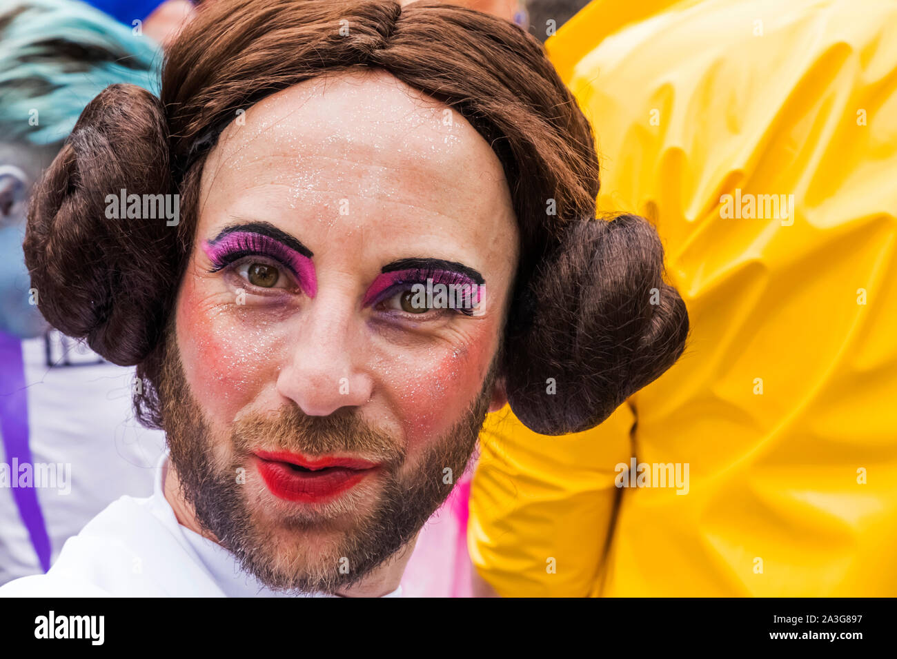 England, London, The Annual Pride Festival, Portrait of Bearded Male Parade Participant Dressed Princess Leia from The Star Wars Movie Stock Photo