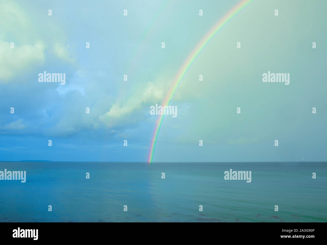 Beautiful Bright Lucent And Real Rainbow Across The Ocean Stock Photo Alamy