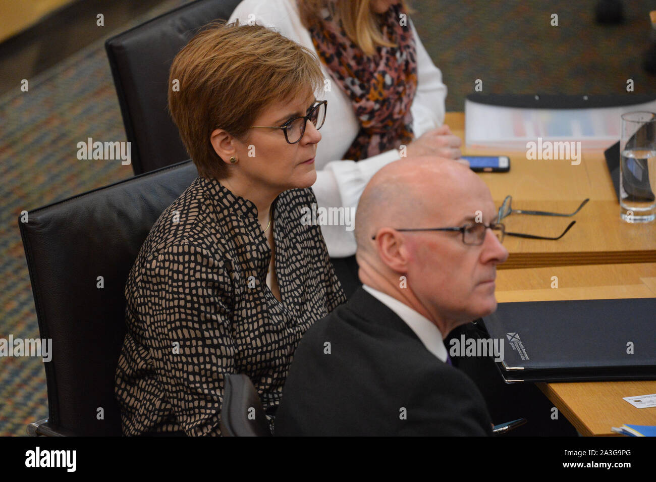 Edinburgh, 8 October 2019. Pictured: (L-R) Nicola Sturgeon MSP - First Minister of Scotland and Leader of the Scottish National Party (SNP); John Swinney MSP - Depute First Minister of Scotland. A report has been published detailing the range of measures being put in place by the Scottish Government to mitigate a ‘no deal' Brexit. Credit: Colin Fisher/Alamy Live News Stock Photo