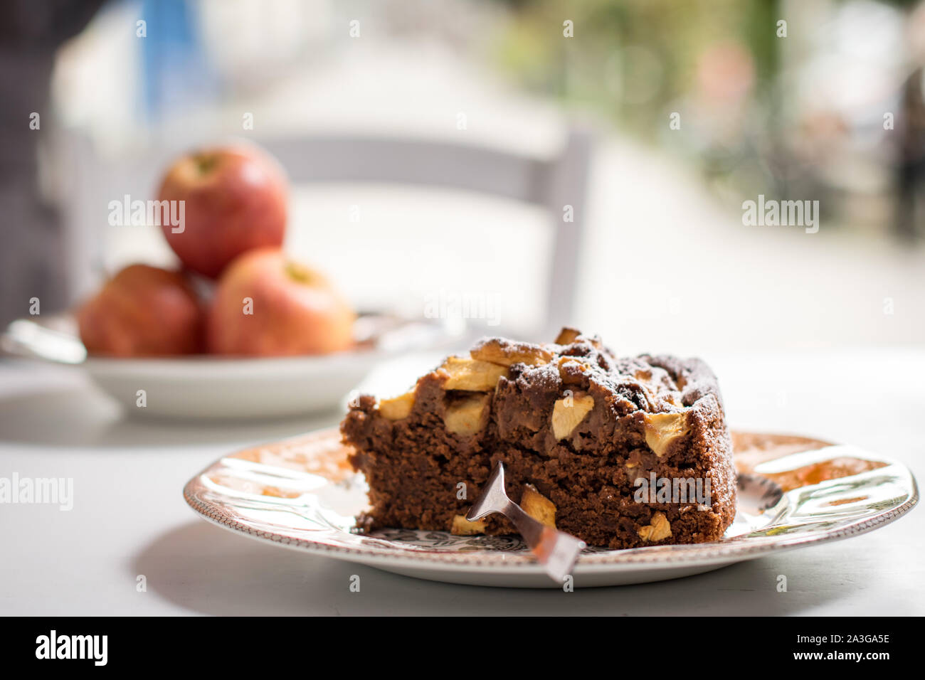 Chocolate cake with fresh apple pieces Stock Photo - Alamy