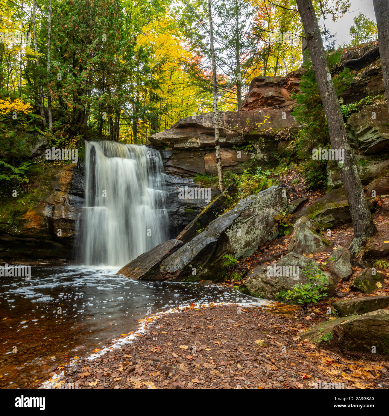The middle waterfall of the Hungarian Falls in the Upper Peninsula of Michigan in the autumn. Stock Photo