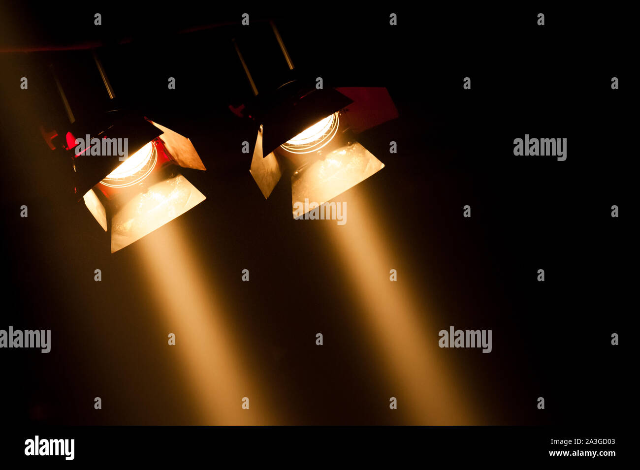 two theatre spotlights on a black background Stock Photo