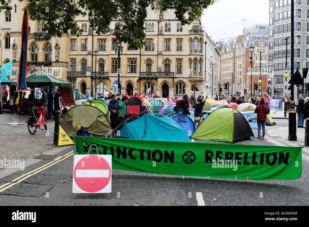 Westminster, London, UK. 8th October 2019. Extinction Rebellion activists block roads around Westminster in a second day of climate-change demonstrations. Credit: Malcolm Park/Alamy Live News. Stock Photo