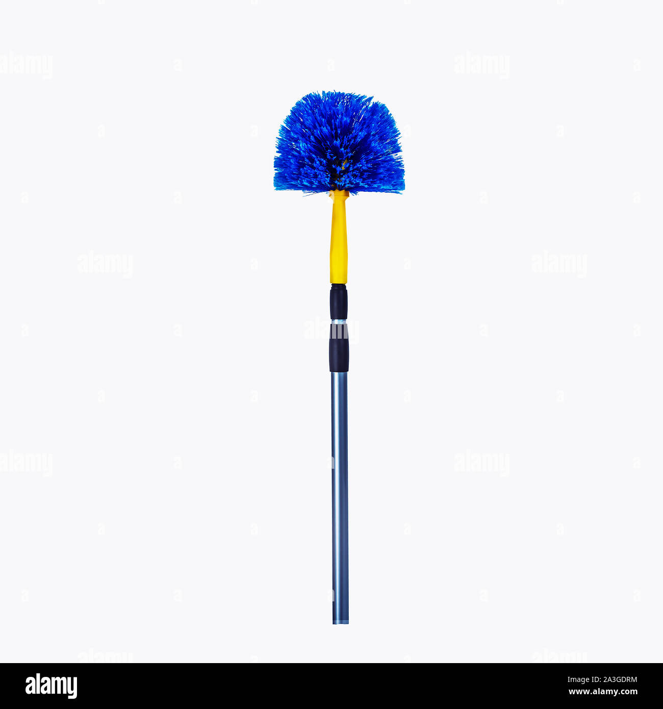 Telescopic extendable spider web sweeper - blue and yellow broom cleaning janitorial Stock Photo