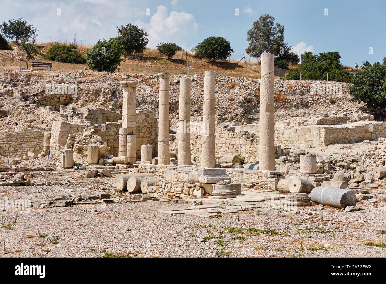 Archaic ruins of the Sanctuary of Apollo Hylates located at the beach of the azure mediterranean sea. Near the Ancient Greek town of Kourion. Limassol Stock Photo
