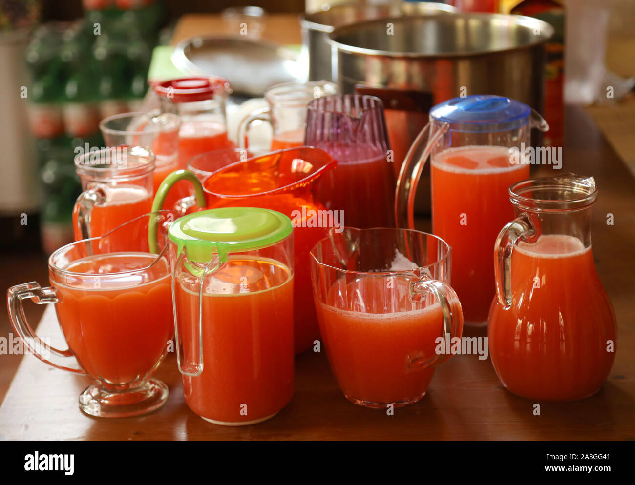many jugs of fruits juice on the tabel during the pary Stock Photo Alamy