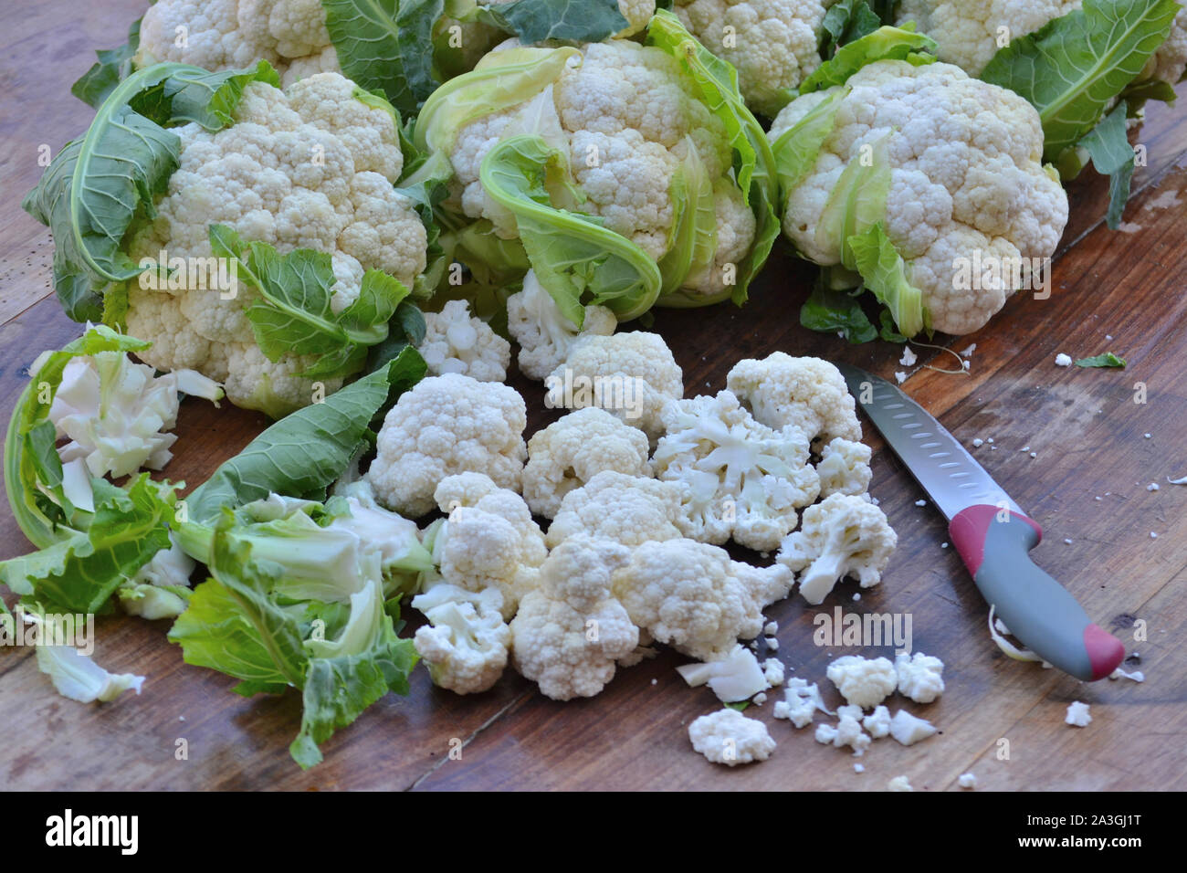 Cauliflower for pickling on a rustic wooden table.  Brassica oleracea  botrytis Stock Photo