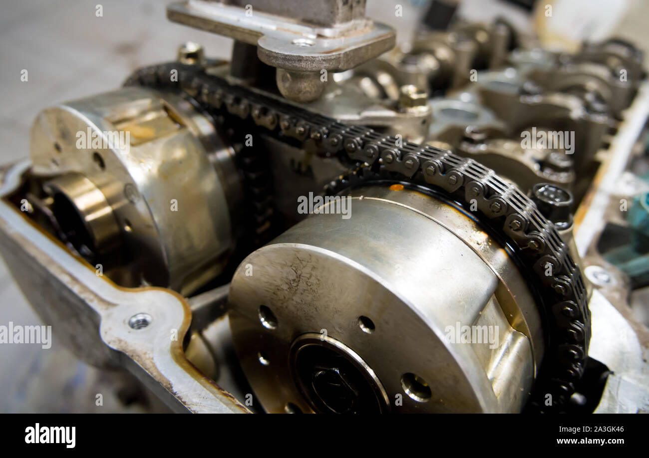 Timing chain drive in a car engine Stock Photo