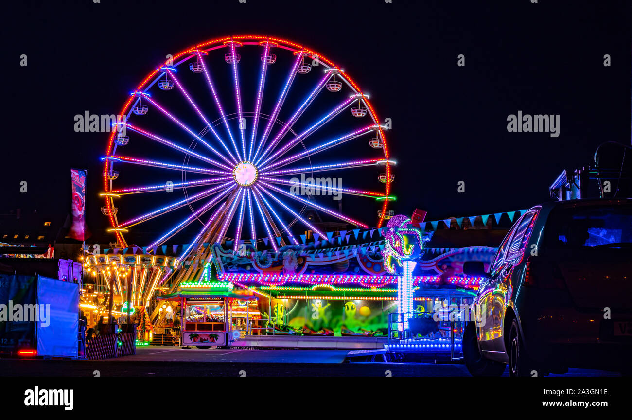 Ferris wheel with lights at the fair Stock Photo