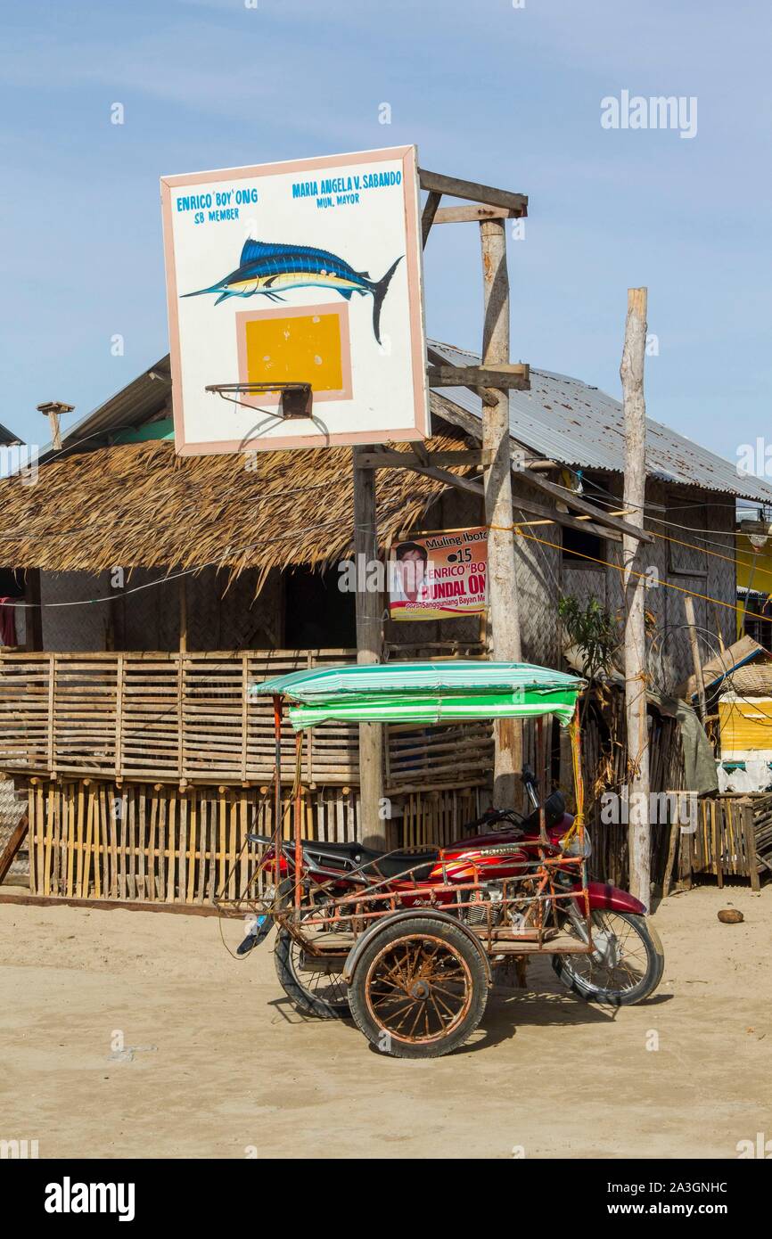 Philippines, Palawan, Roxas, Johnson Island, tricycle on the basketball playground Stock Photo