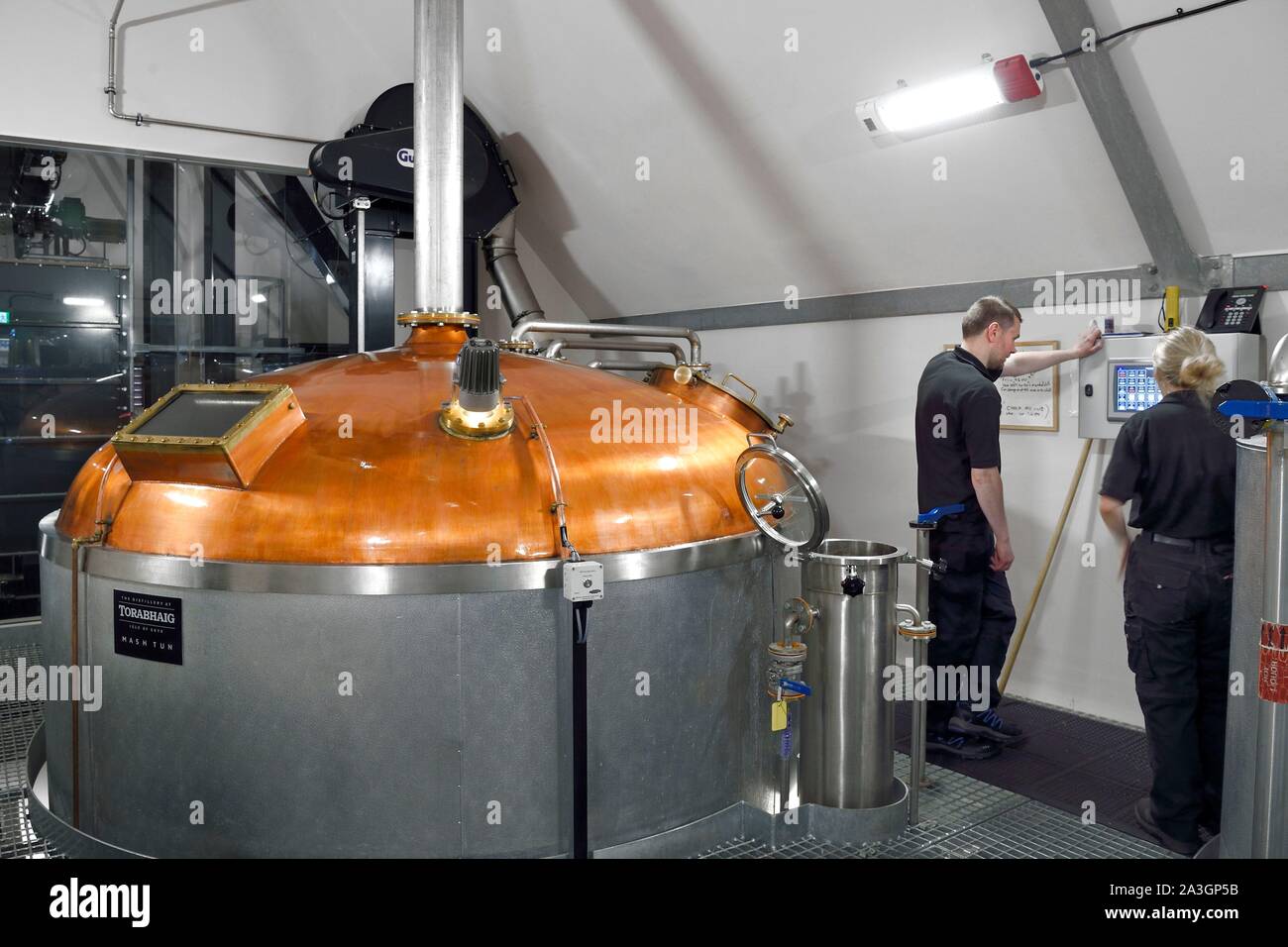 https://c8.alamy.com/comp/2A3GP5B/united-kingdom-scotland-highlands-hebrides-isle-of-skye-teangue-torabhaig-whisky-distillery-mash-tun-in-the-brew-kettle-supervised-by-distiller-david-2A3GP5B.jpg