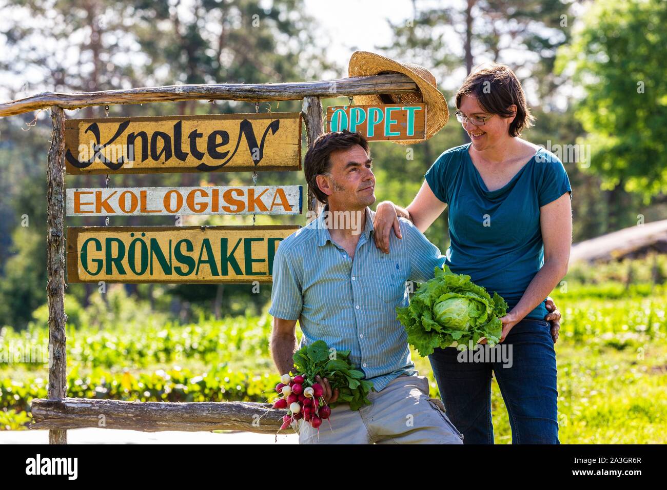 Sweden, County of Vastra Gotaland, Hokerum, Ulricehamn hamlet, Rochat family report, Pierre and Sonia at the entrance of the property Stock Photo