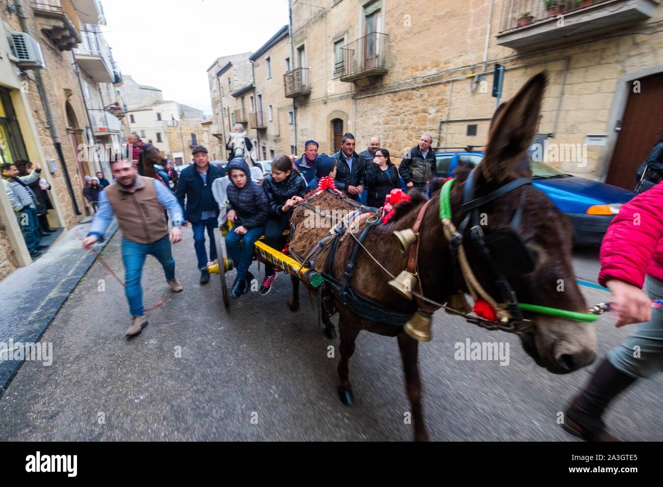 Italy, Sicily, Calascibetta, feast of San Giuseppe on March 19th, parade on horseback and distribution of bread in the streets of the village Stock Photo