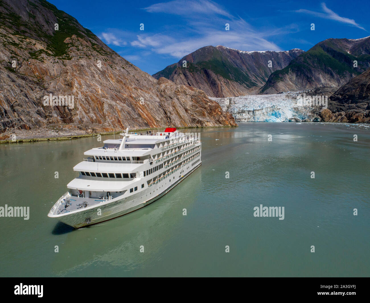 USA, Alaska, Tracy Arm - Fords Terror Wilderness, Aerial view of cruise ship M/S American Constitution motoring near Sawyer Glacier in Tracy Arm on su Stock Photo