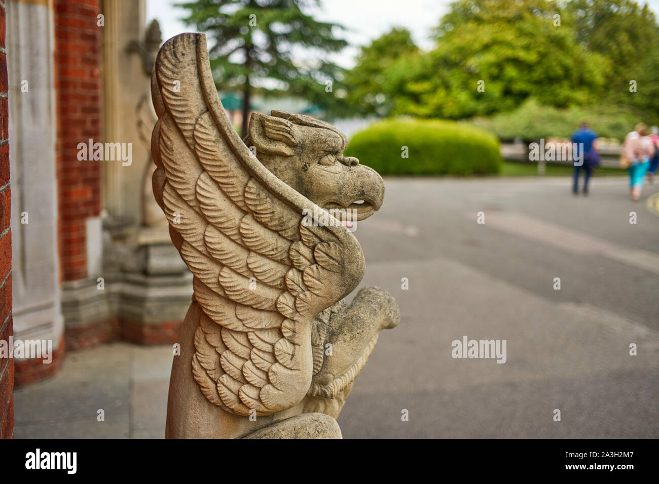 A griffin stone statue outside the main door of the house at Bletchley Park museum Stock Photo