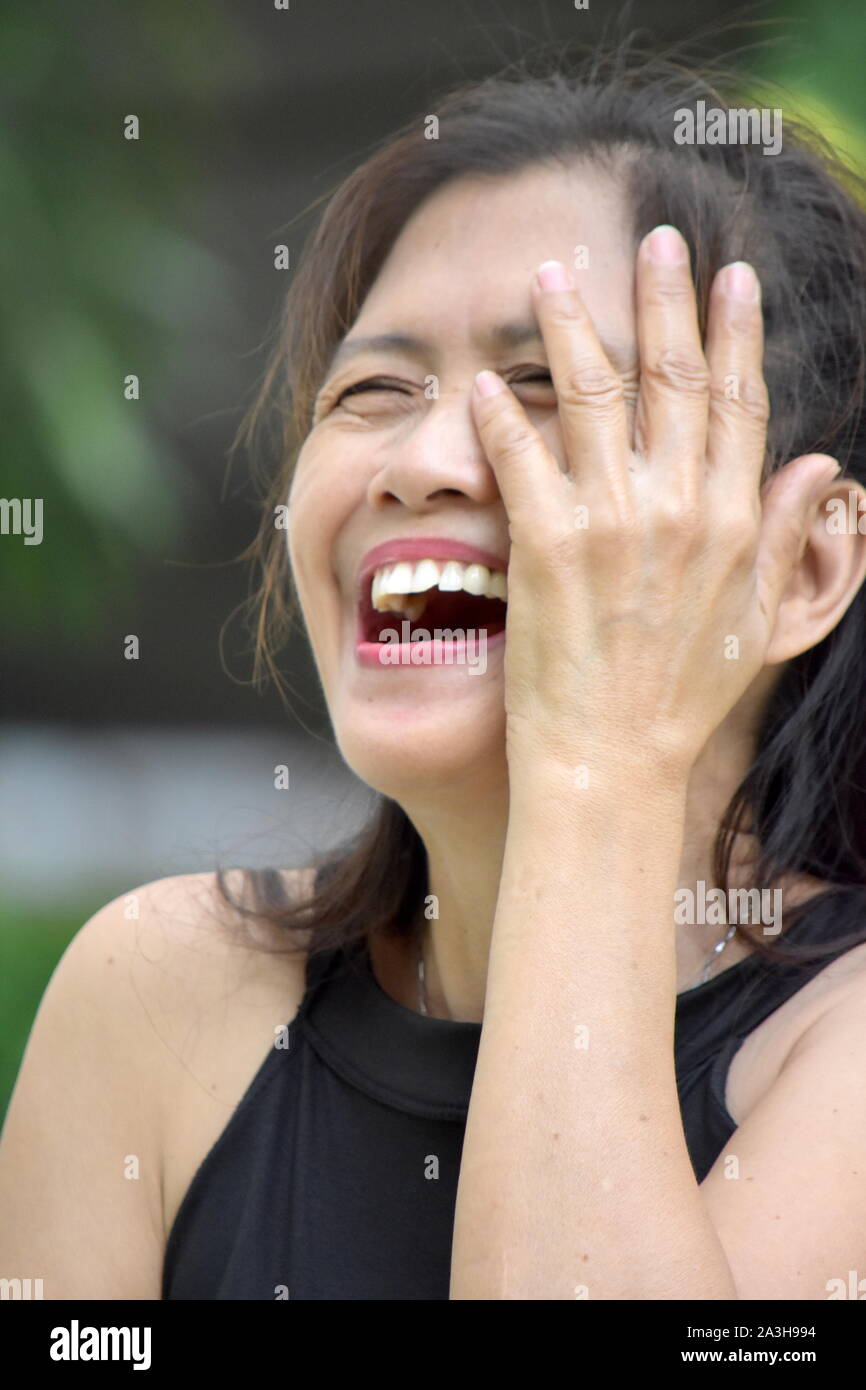 A Senior Minority Grandma Laughing Stock Photo