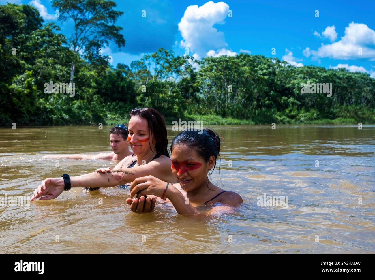 Ecuador, Tena, immersion life experience with the Waoranis of the Rio Nushino, wading in the Nushino rio, clay ointments Stock Photo