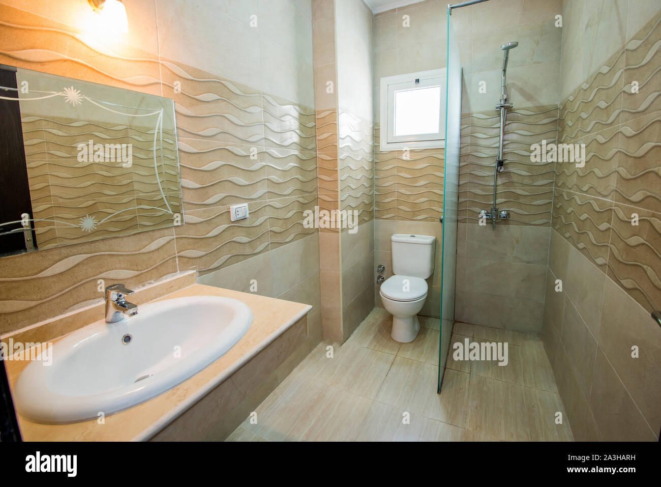 Interior design of a luxury show home bathroom with shower cubicle wet