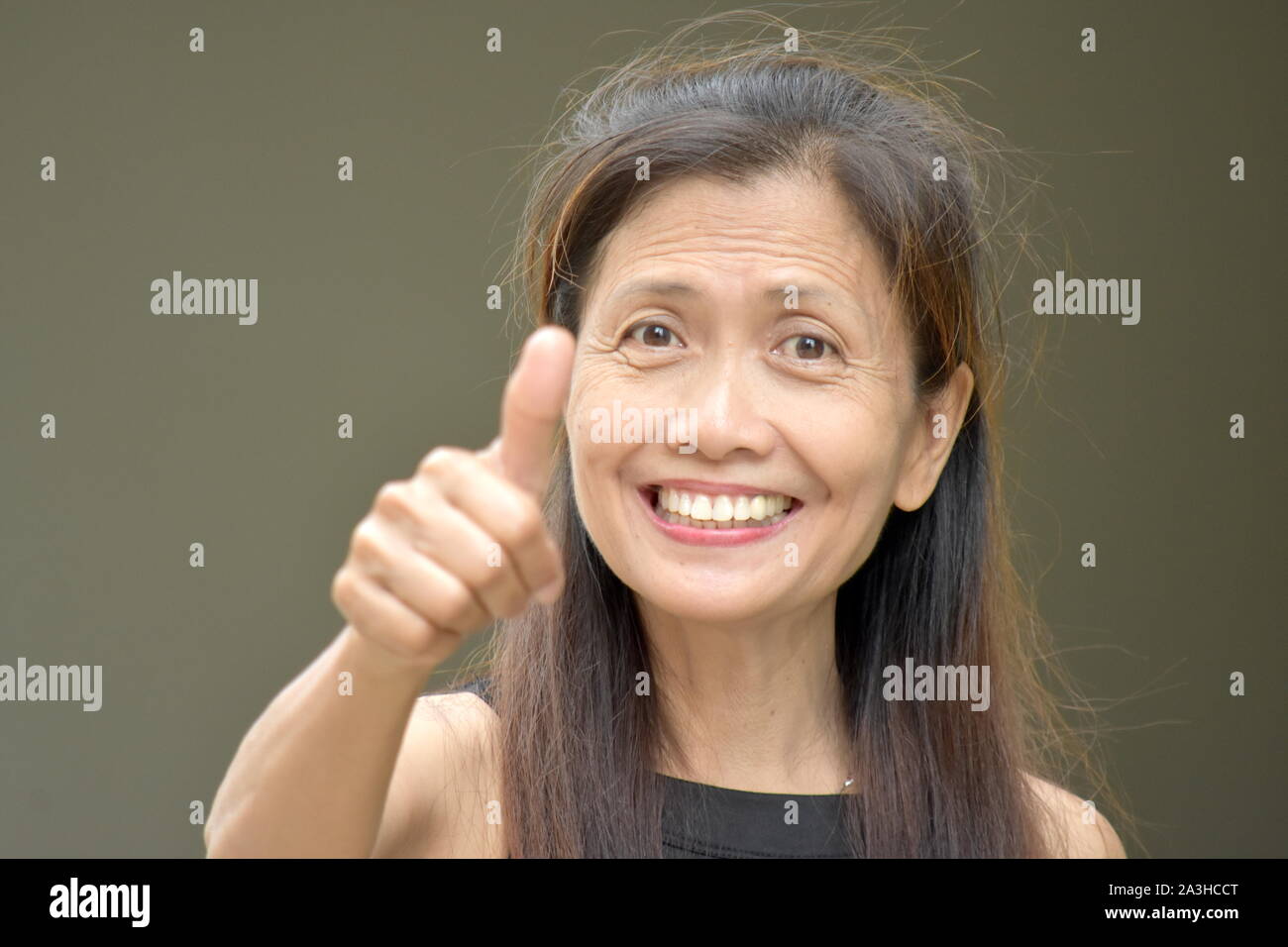 Senior woman thumbs up hi-res stock photography and images - Alamy