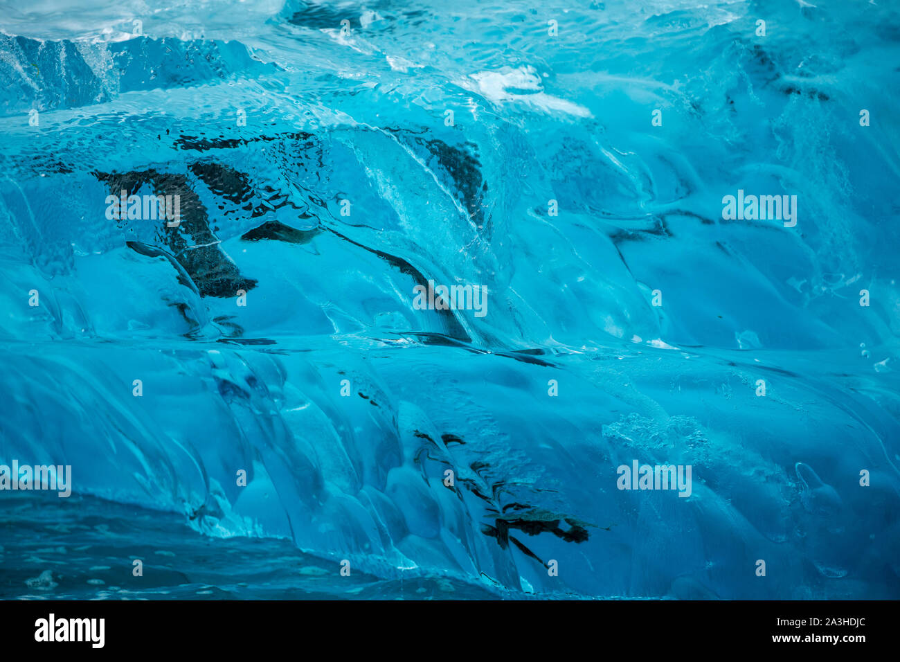 USA, Alaska, Close-up view of deep blue  iceberg floating near calving face of LeConte Glacier east of Petersburg Stock Photo