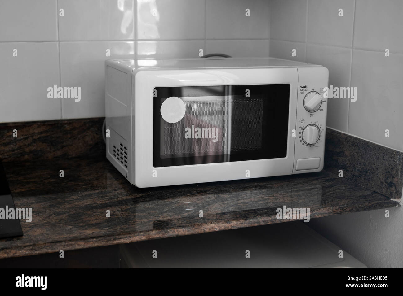 Woman microwave heat hires stock photography and images Alamy