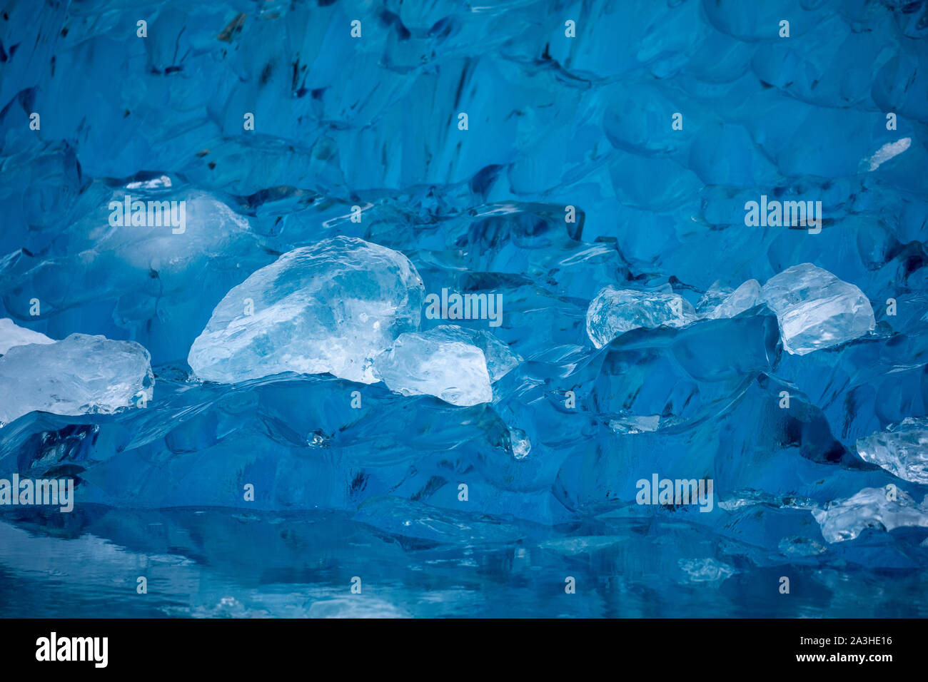 USA, Alaska, Close-up view of deep blue iceberg floating near calving face of LeConte Glacier east of Petersburg Stock Photo