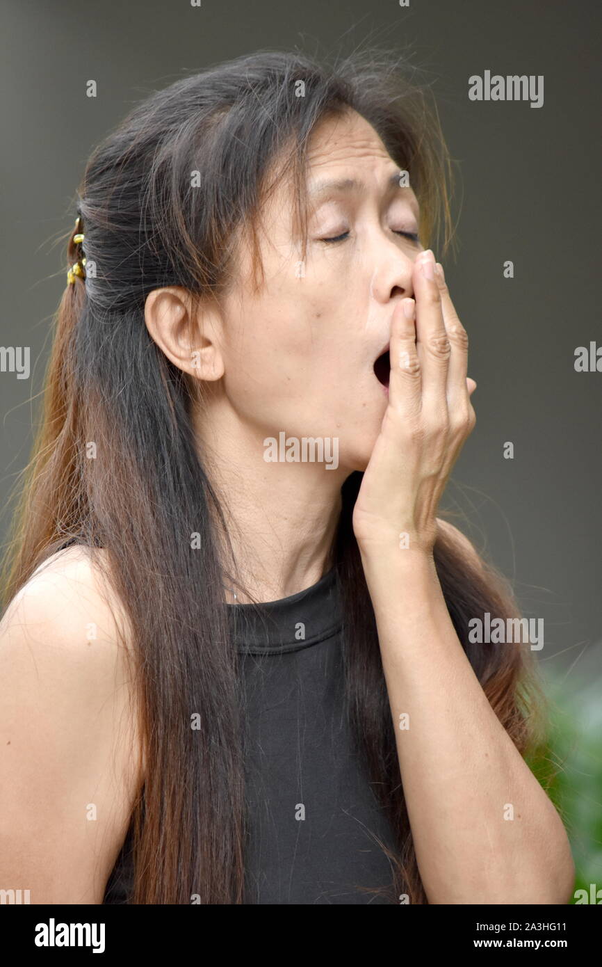 A Sleepy Female Senior Stock Photo