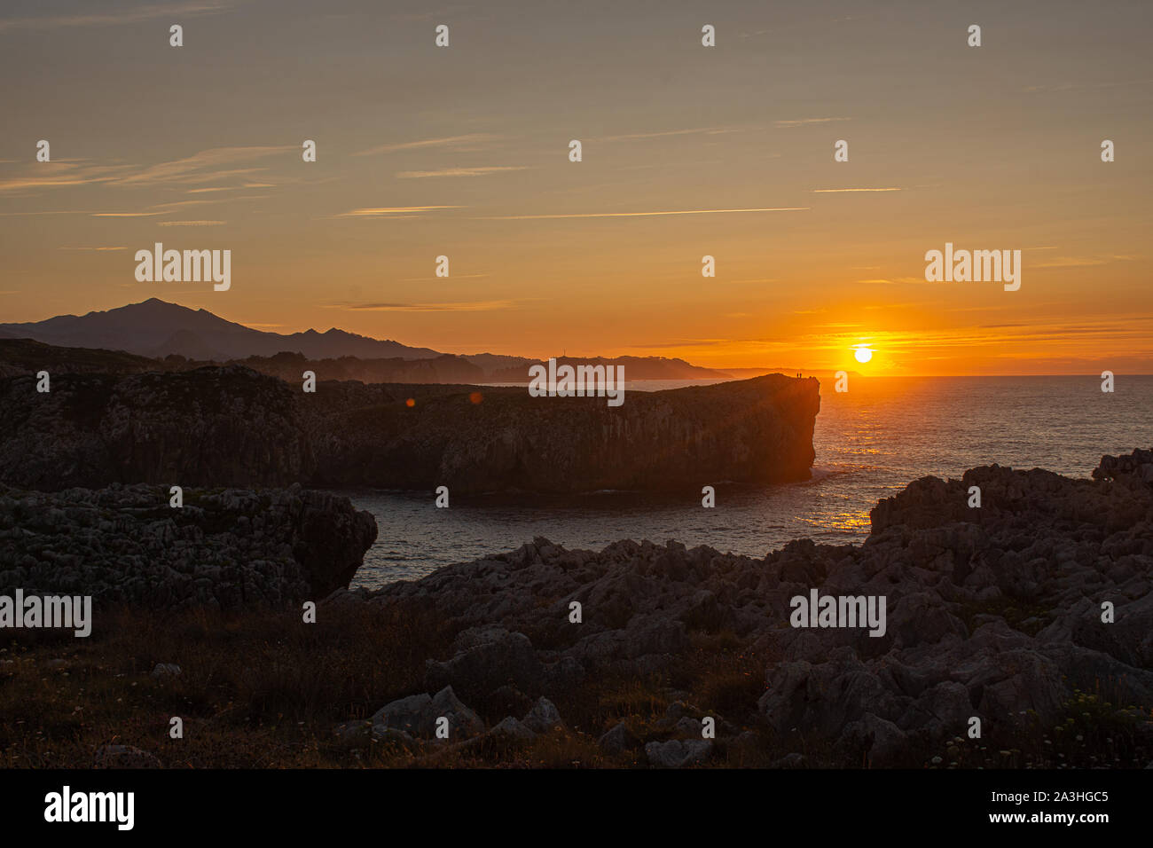 sunset on a cliff in Asturias Stock Photo