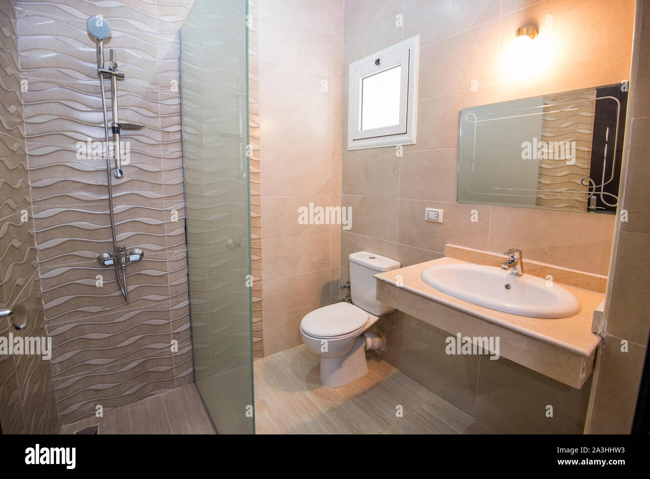Interior design of a luxury show home bathroom with shower cubicle wet ...