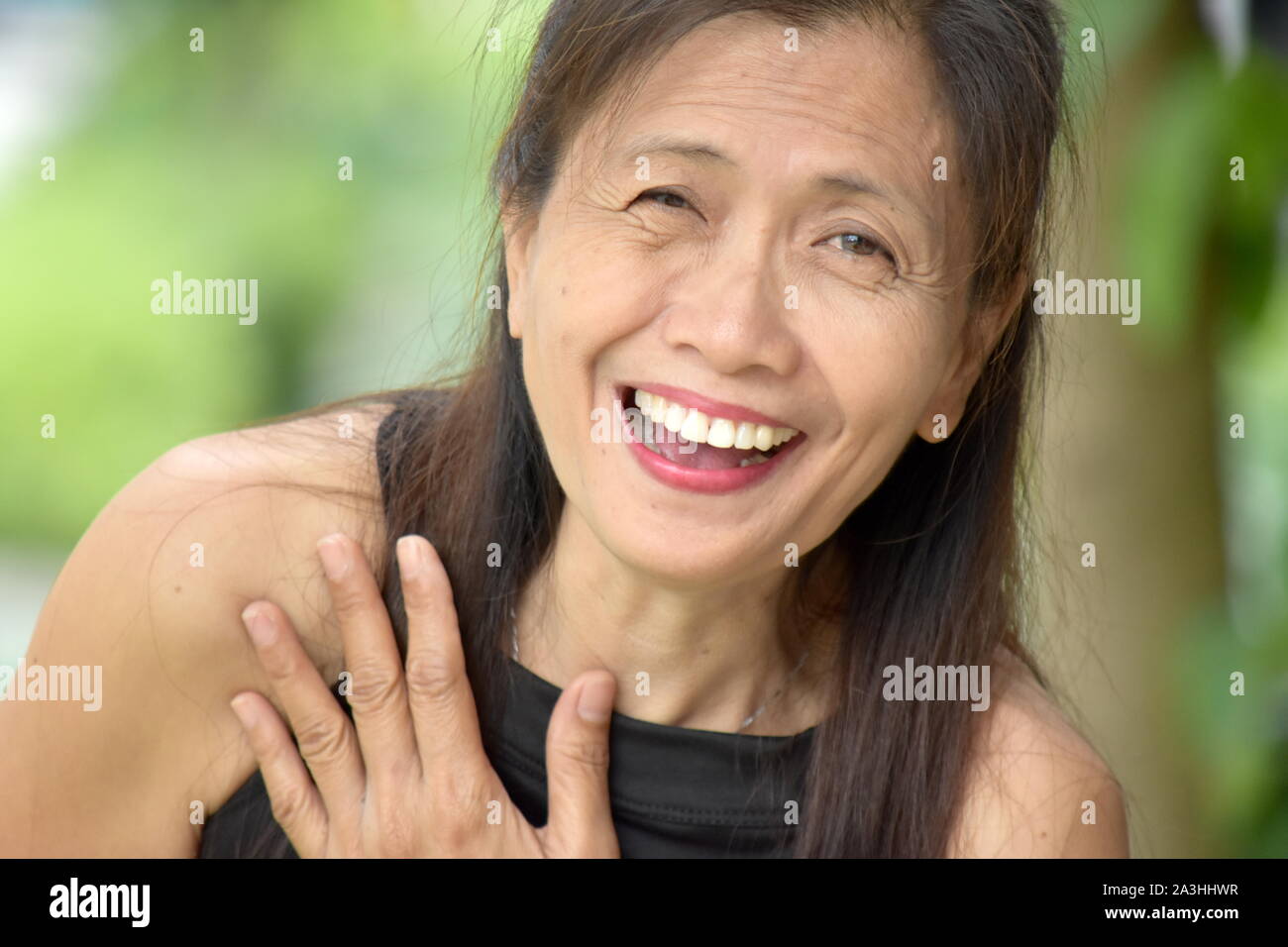 A Woman And Laughter Stock Photo