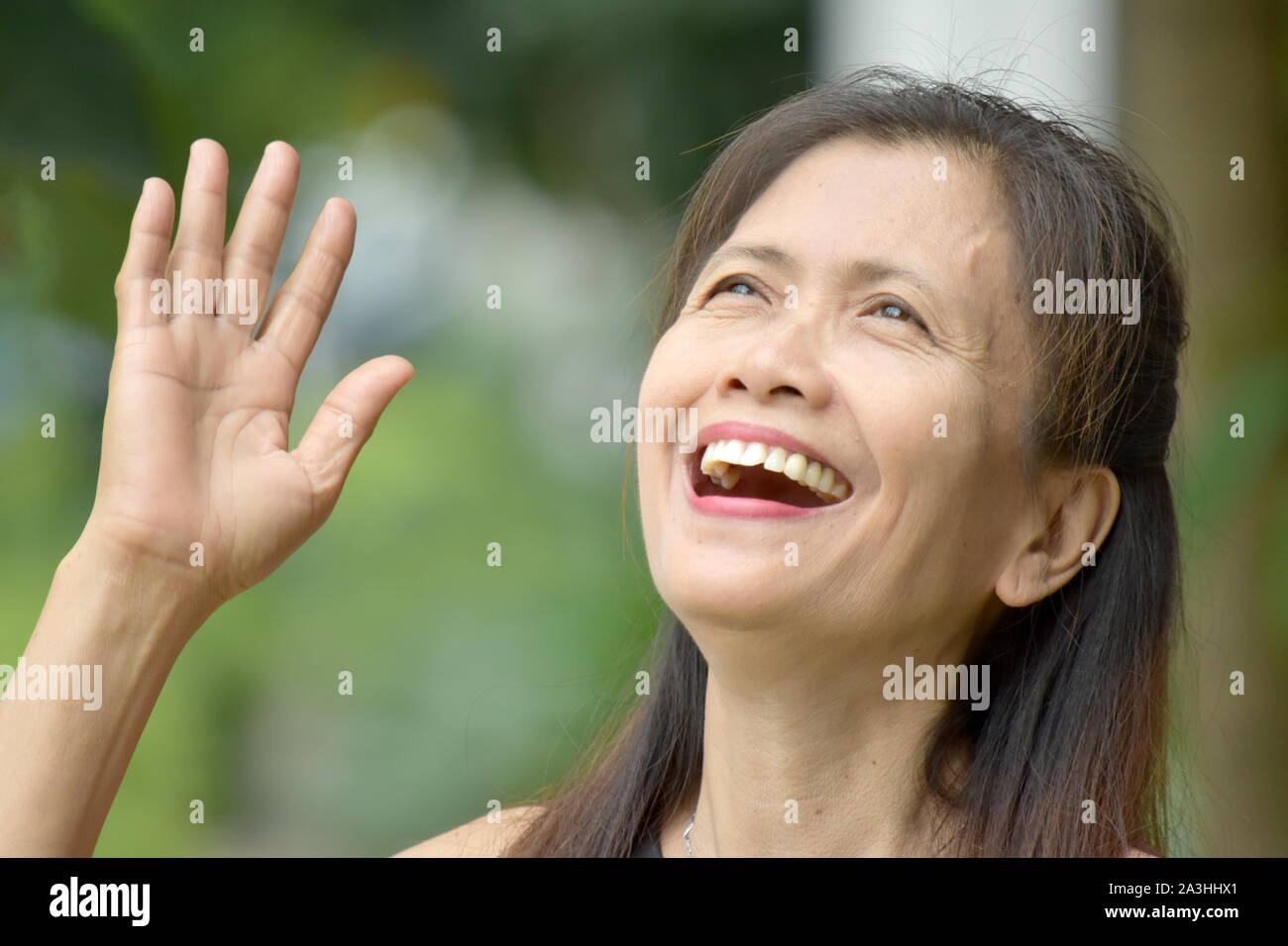 A Filipina Female Senior Laughing Stock Photo