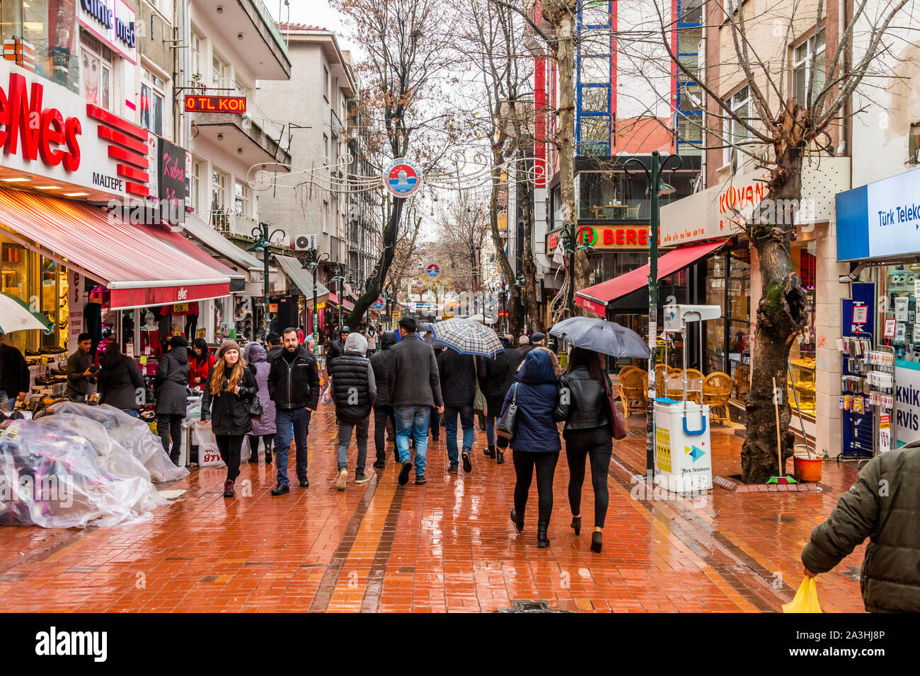 People walking under the rain on the shore of Maltepe. July 16, 2019, istanbul, Turkey Stock Photo