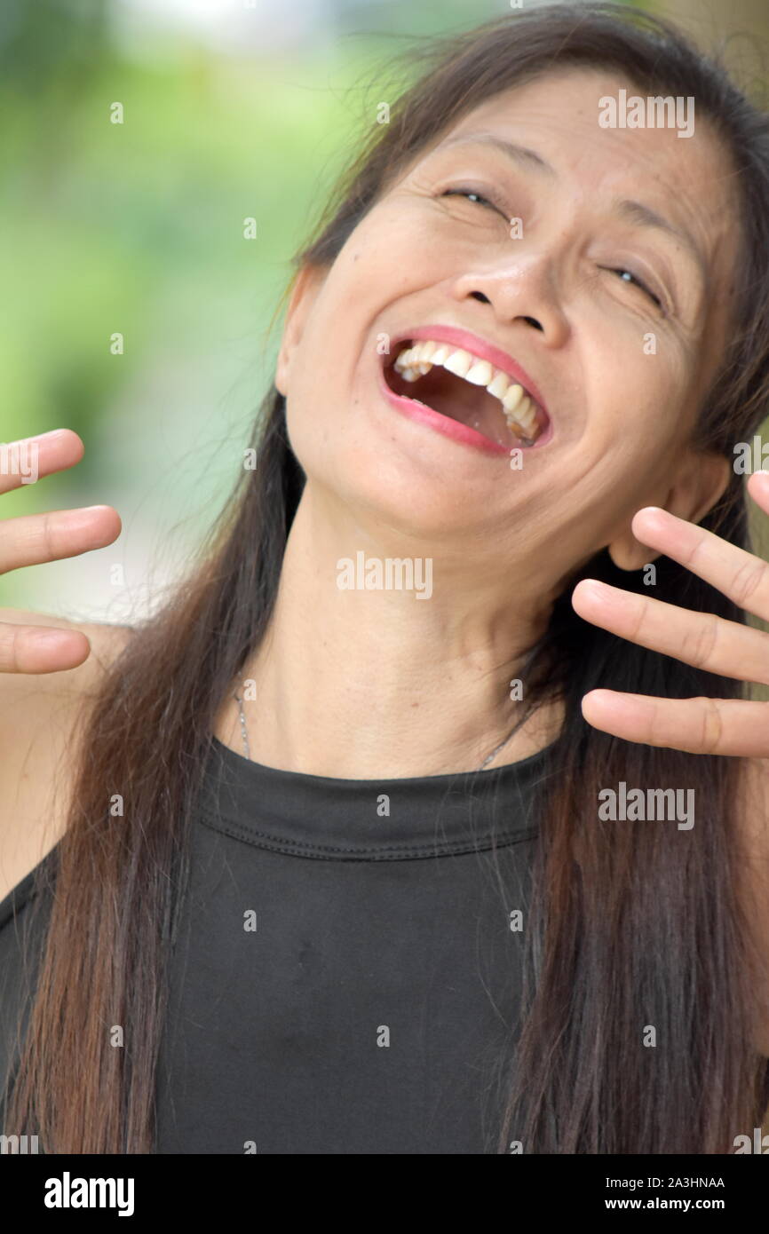 A Minority Female Senior Laughing Stock Photo