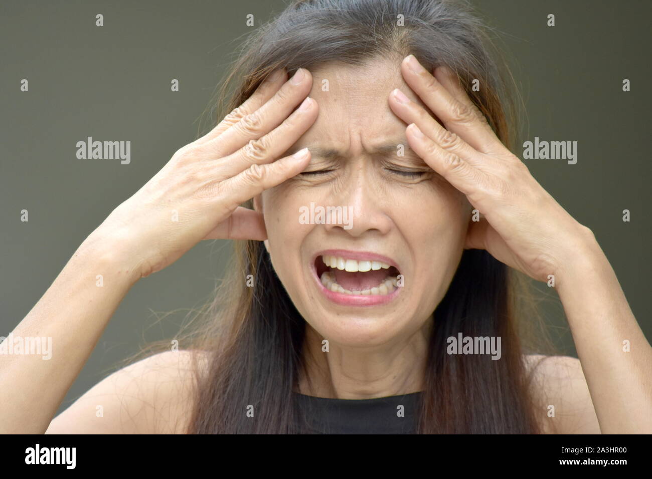 A Dementia And Senior Minority Person Stock Photo